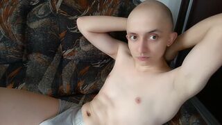 Shaved boy with long foreskin plays with his asshole and cums